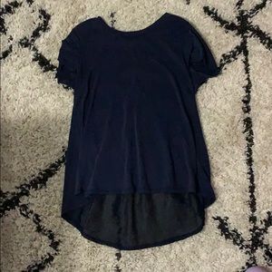 Soft short sleeve top with sheer back